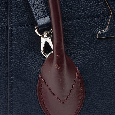 Louis Vuitton Calfskin Freedom Tote (SHF-16427)